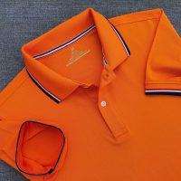 Áo polo phối bo sọc màu cam