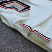 Chi tiết sản phẩm áo cổ trụ polo bo sọc cá sấu lạnh poly thấm hút màu trắng