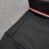 Chi tiết sản phẩm áo cổ trụ polo bo sọc cá sấu lạnh poly thấm hút màu đen