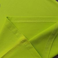 Chi tiết vạt áo áo thun cổ tròn ngắn tay cotton cao cấp xanh chuối