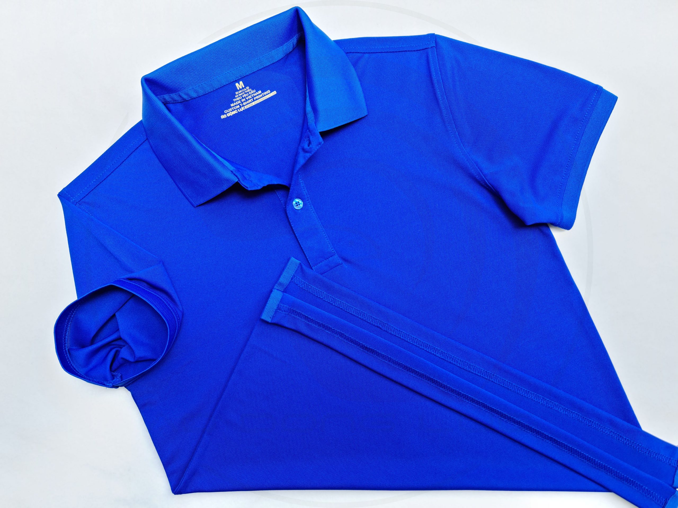 Áo thun cổ trụ polo bo trơn cá sấu lạnh poly thấm hút xanh bích