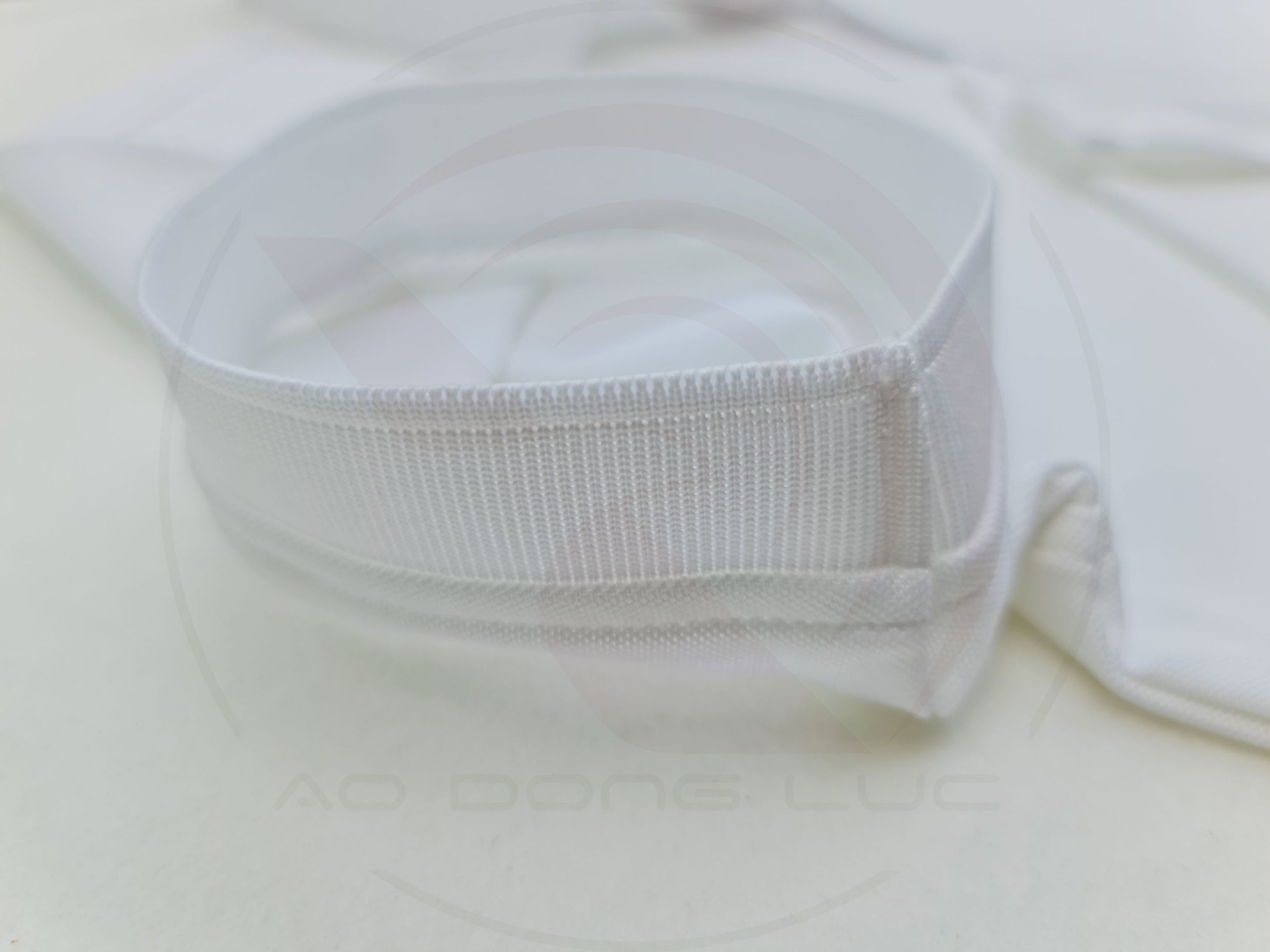 Chi tiết bo tay spandex áo thun cổ trụ polo bo trơn cá sấu lạnh poly màu trắng