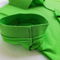 Chi tiết bo tay áo thun cổ trụ polo bo trơn cá sấu lạnh xanh lá