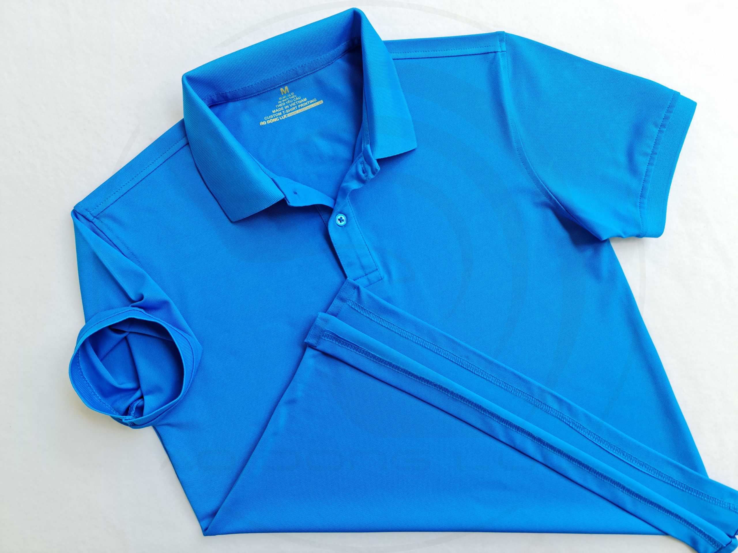 Áo thun cổ trụ polo bo trơn cá sấu lạnh poly thấm hút màu xanh ya
