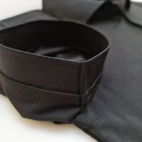 Chi tiết bo tay spandex áo cổ trụ polo bo trơn unisex cá sấu mè màu đen