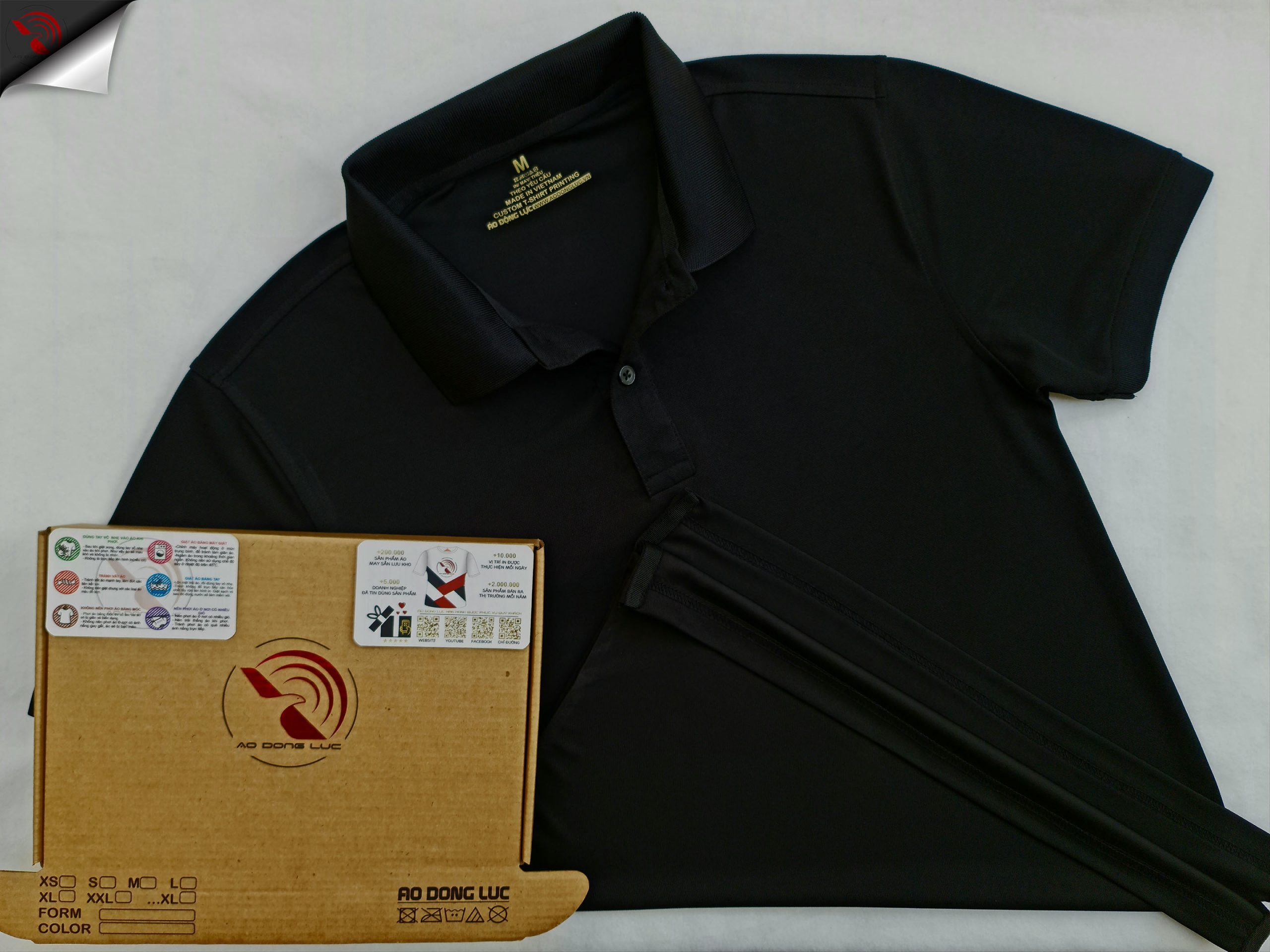 Hình tổng thể áo cổ trụ polo bo trơn unisex cá sấu mè màu đen