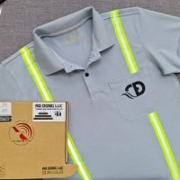 Đồng phục áo thun polo màu xám lam may phối dây quảng quang in kỹ thuật số