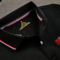 Đồng phục áo thun polo bo sọc màu đen thêu logo