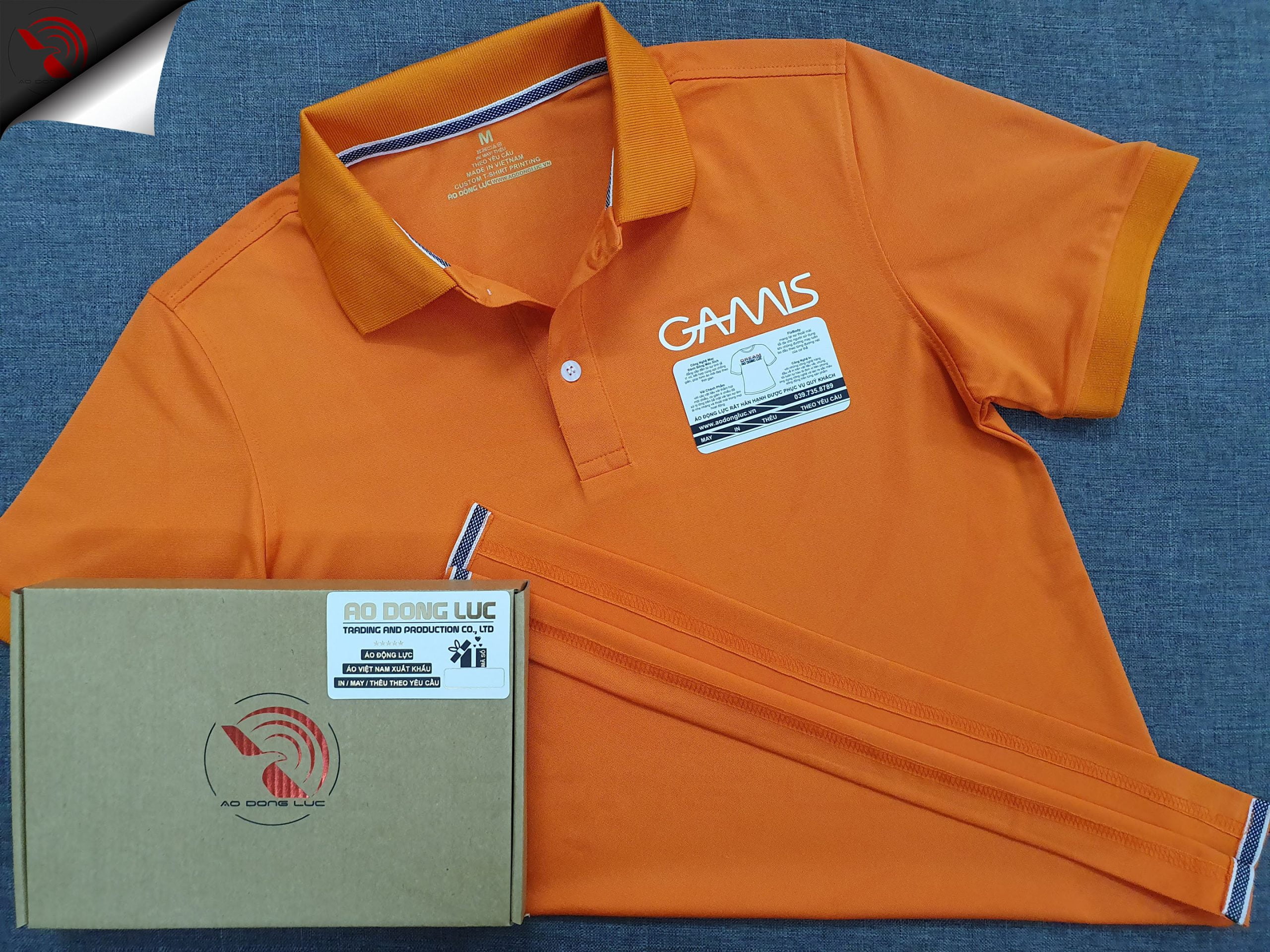 Đồng phục áo thun polo bo trơn màu cam in decal logo