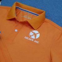 Đồng phục áo thun polo bo trơn màu cam thêu logo