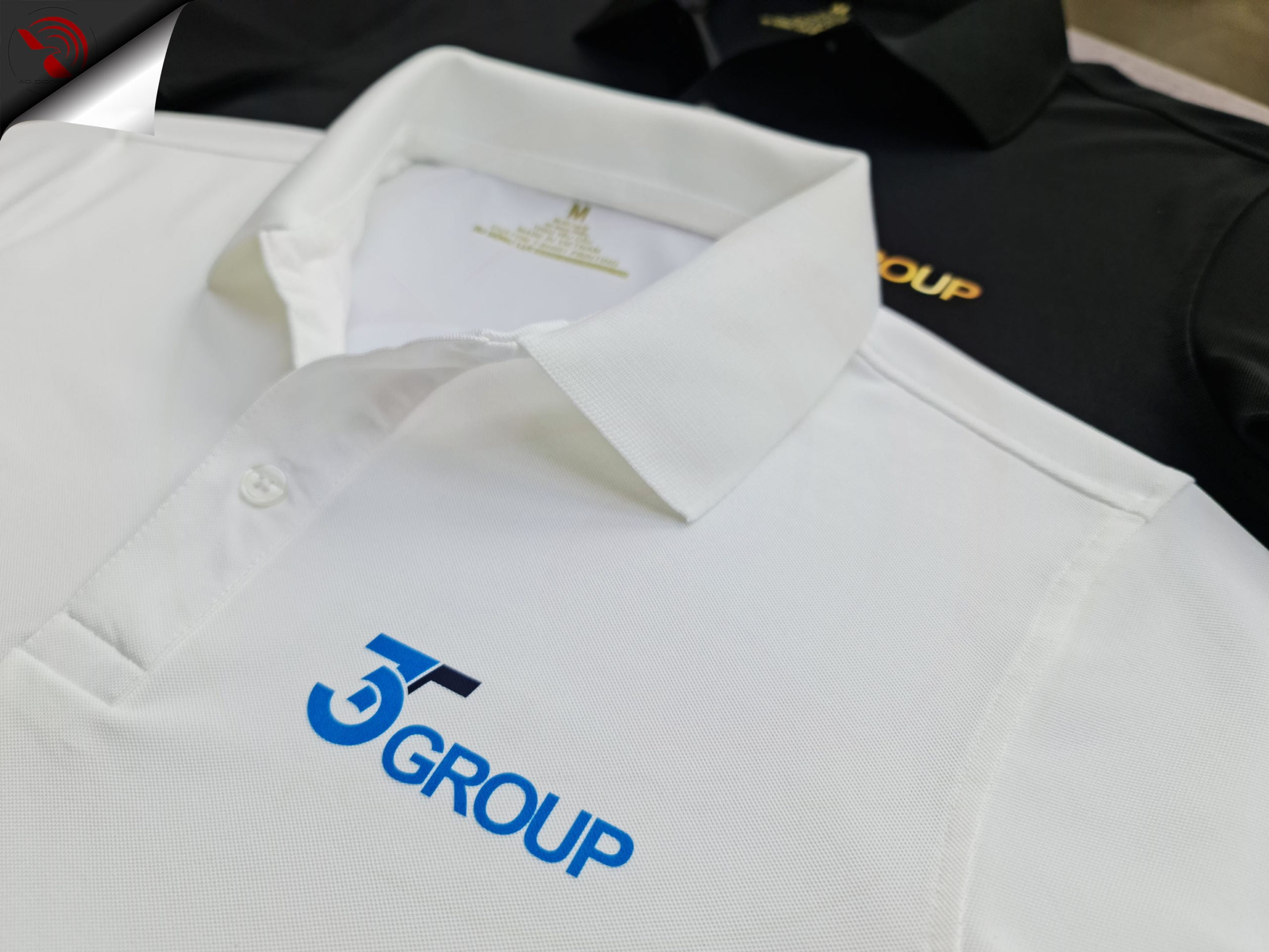 Đồng phục áo thun polo bo trơn in kỹ thuật số logo