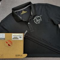 Đồng phục áo thun polo bo trơn màu đen in lụa