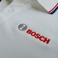 Hình thêu vi tính lên áo thun đồng phục polo màu trắng bo sọc
