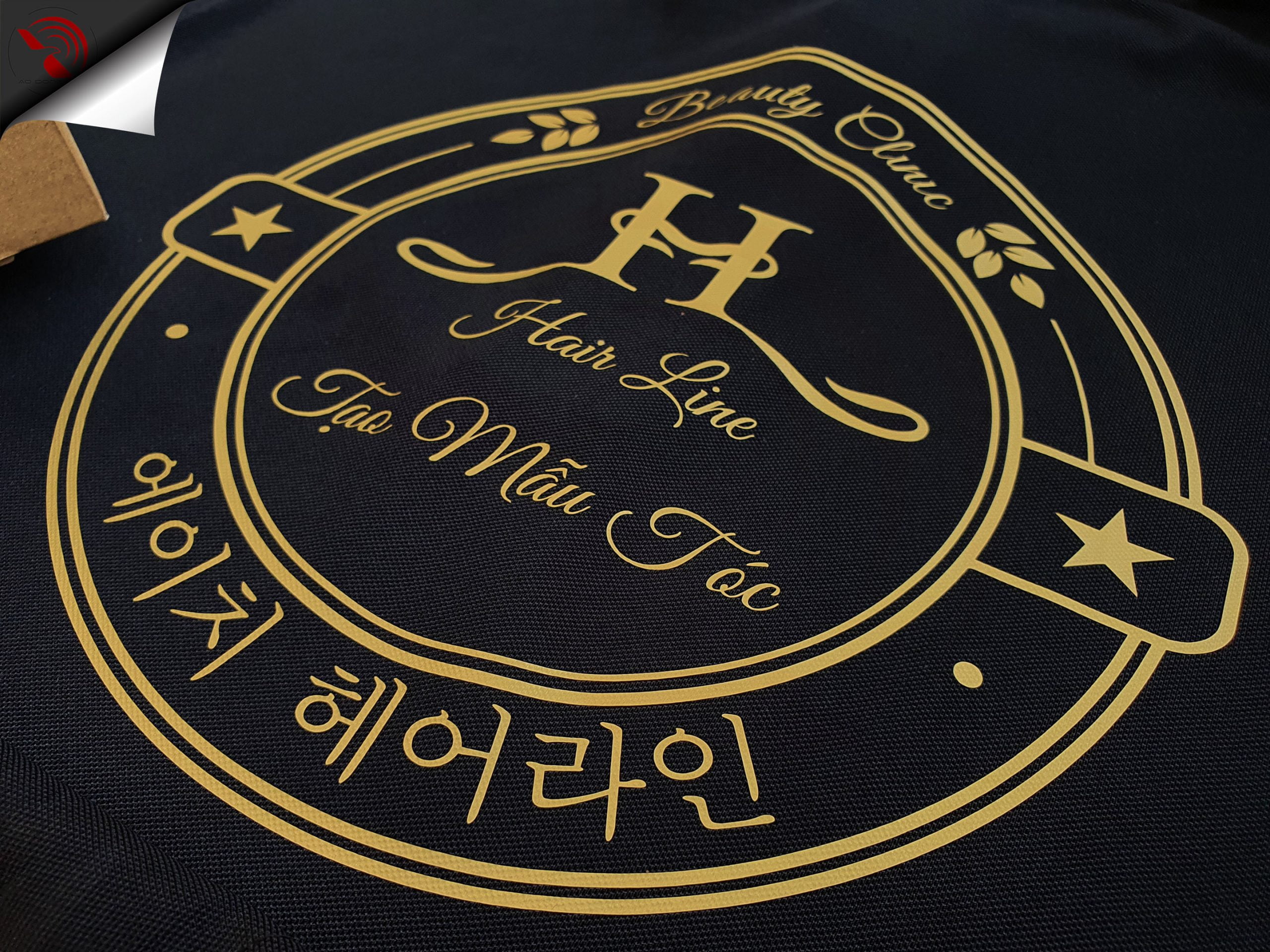 Hình in decal vàng đồng áo thun đồng phục theo yêu cầu