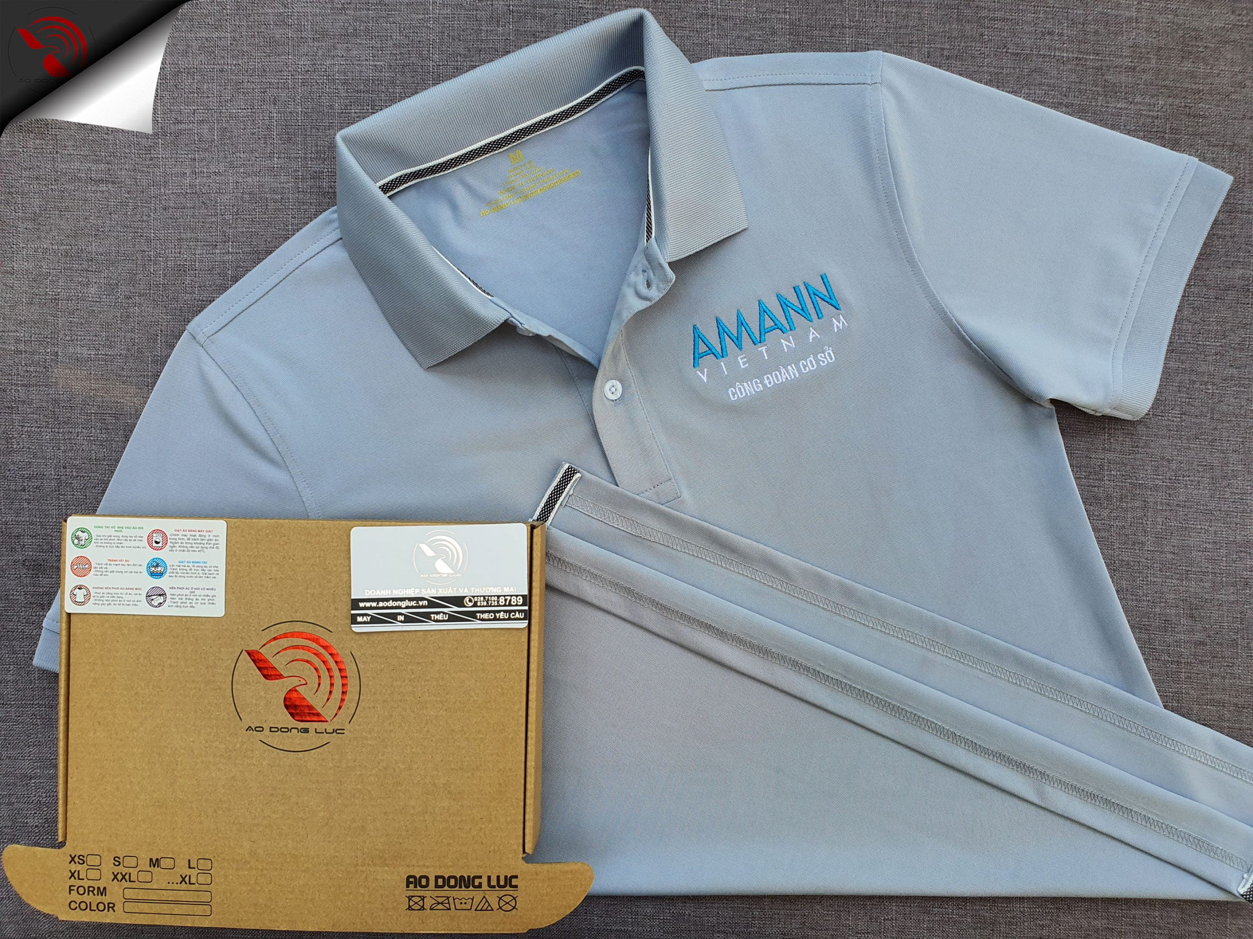 Đồng phục áo thun polo bo trơn xám lam thêu logo