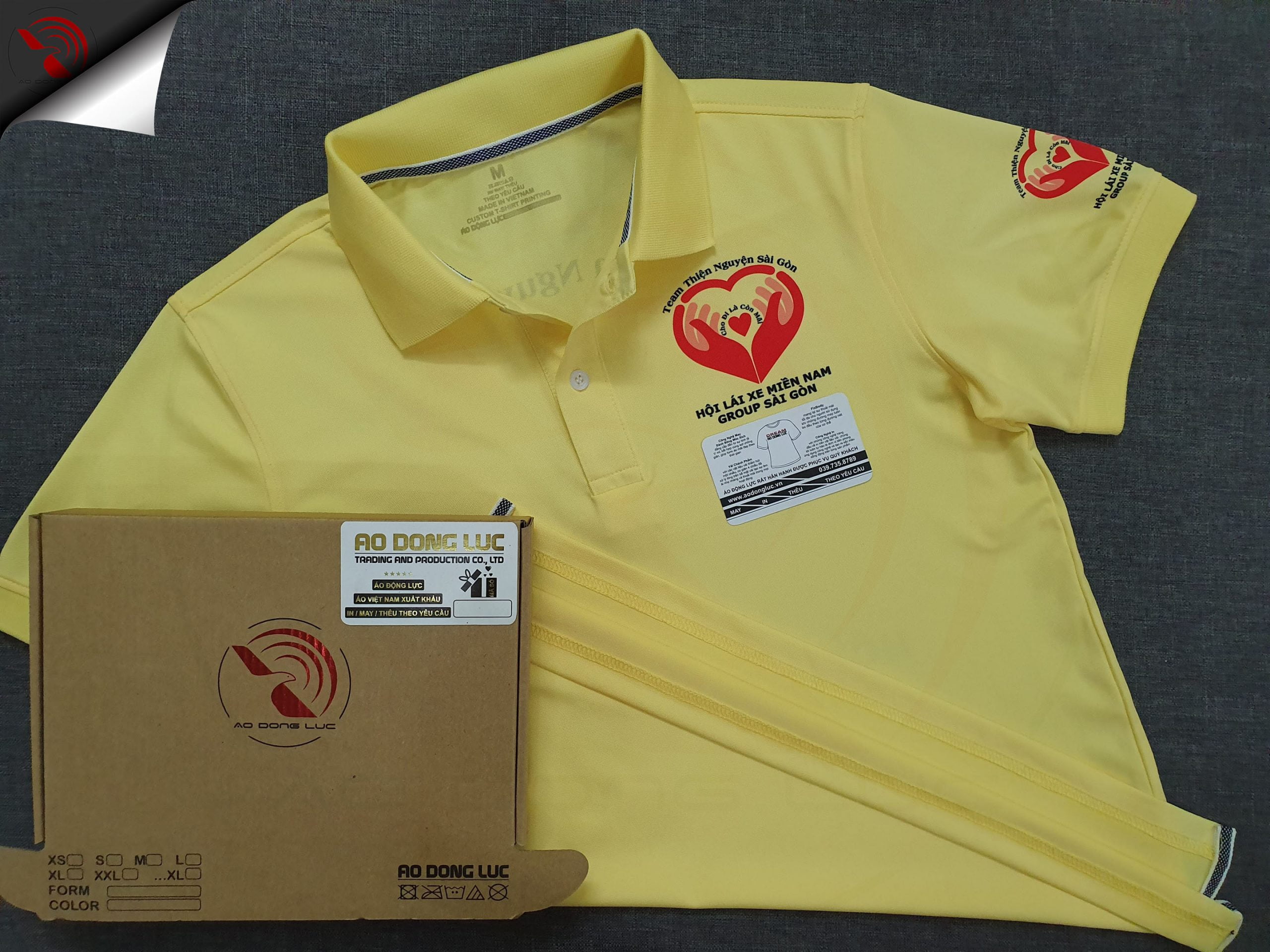 Đồng phục áo thun polo bo trơn màu vàng in chuyển nhiệt logo