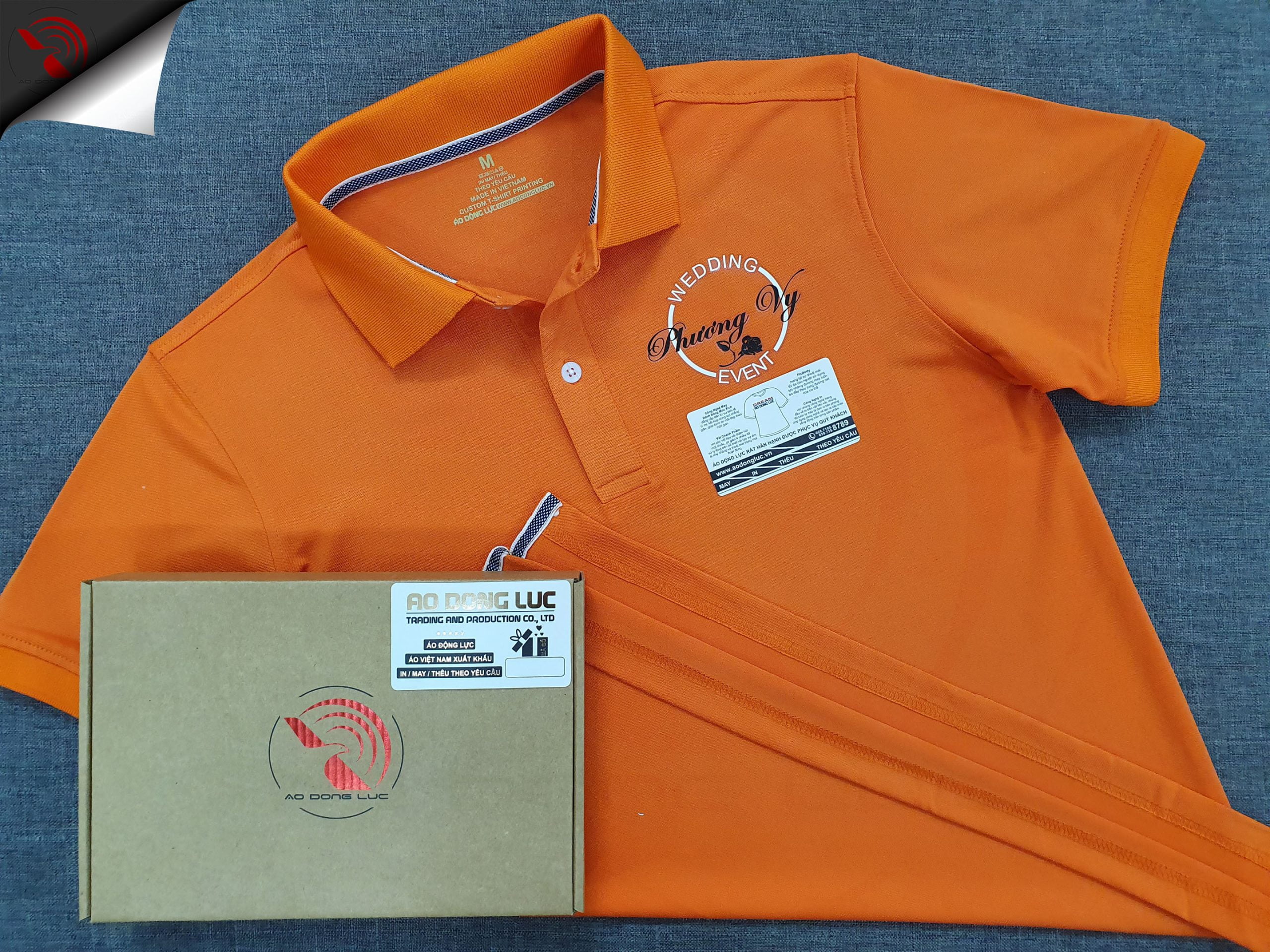 Đồng phục áo thun polo bo trơn màu cam in decal phản quang kết hợp