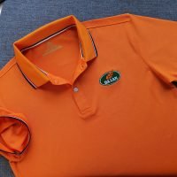 Đồng phục áo thun polo bo sọc màu cam thêu logo