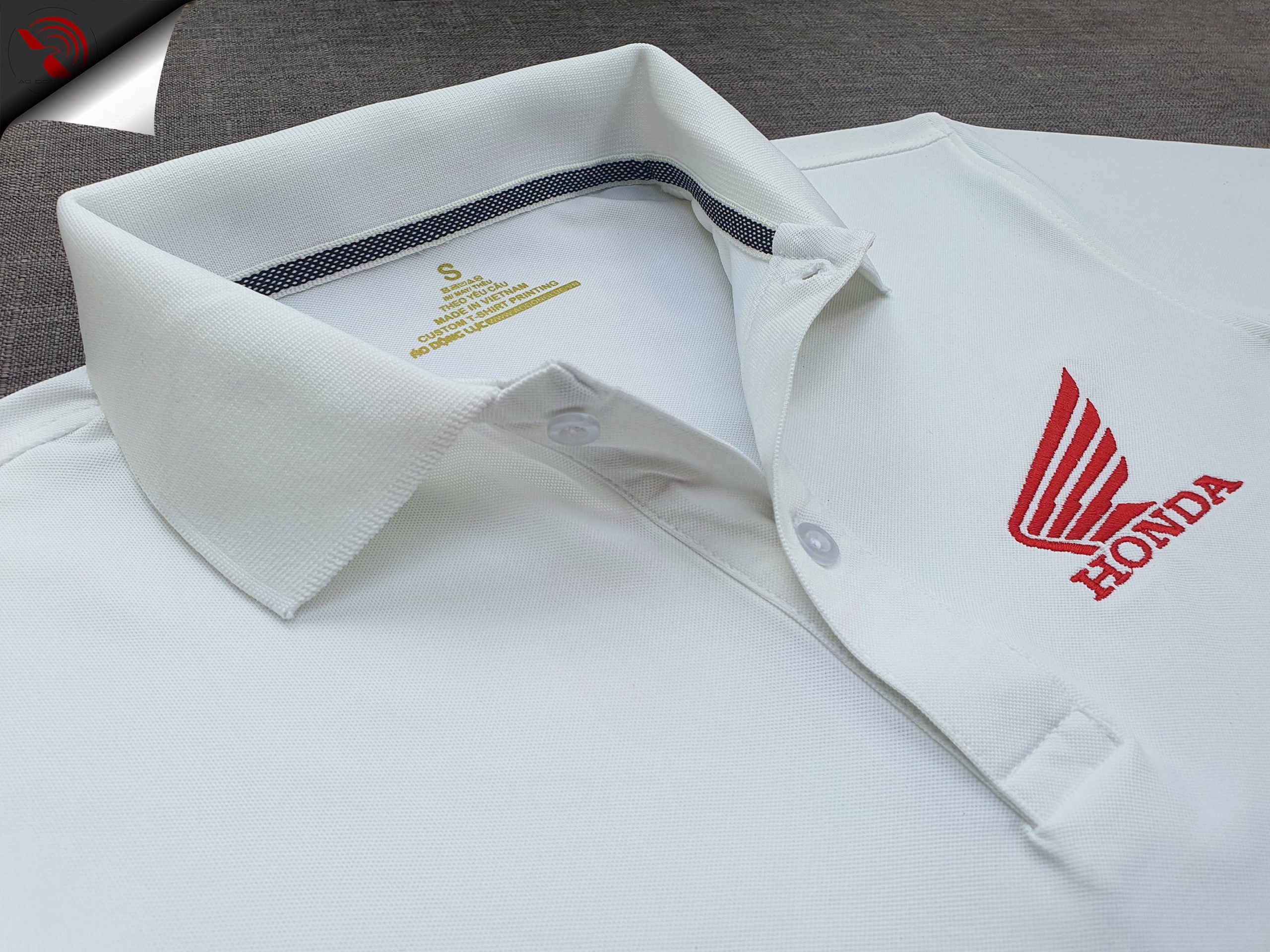 Đồng phục áo thun polo bo trơn màu trắng thêu logo