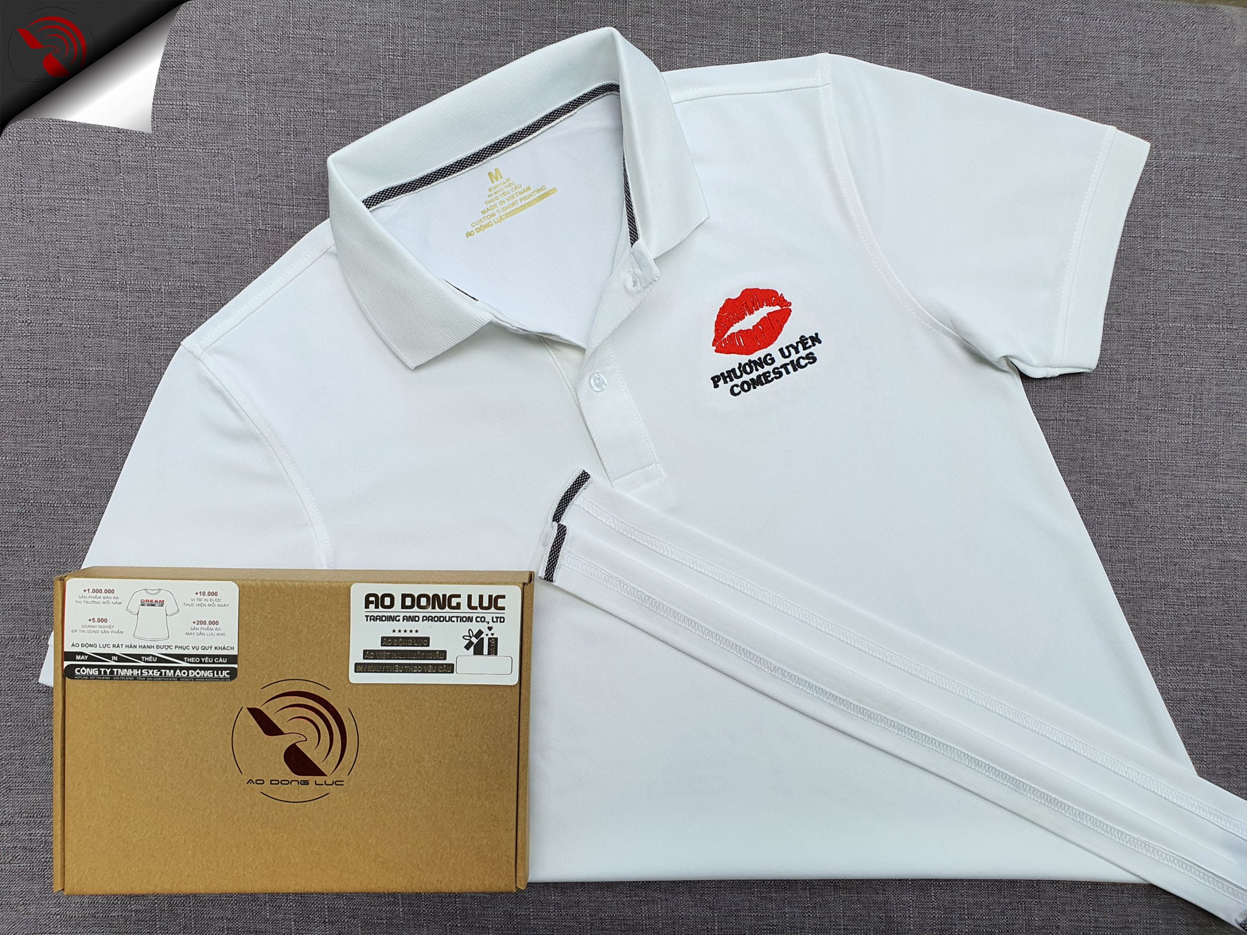 Đồng phục áo thun polo bo trơn màu trắng thêu logo